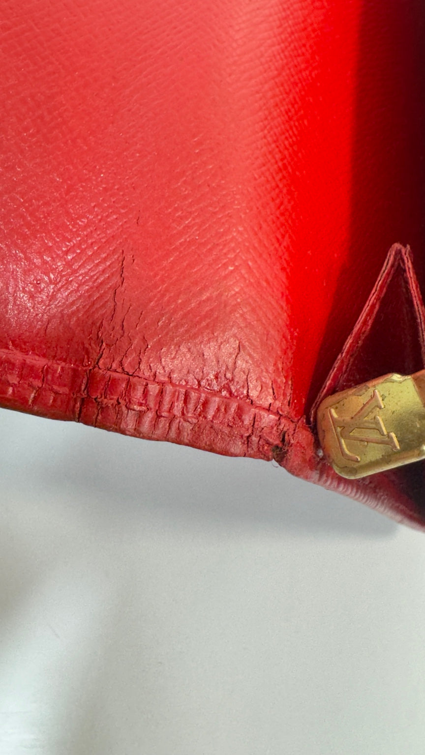 Louis Vuitton wallet chain attachment and corner wear