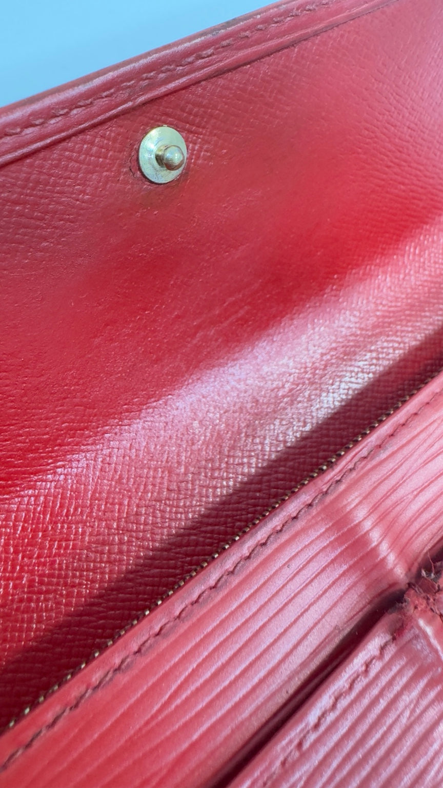 Louis Vuitton wallet interior leather and snap detail
