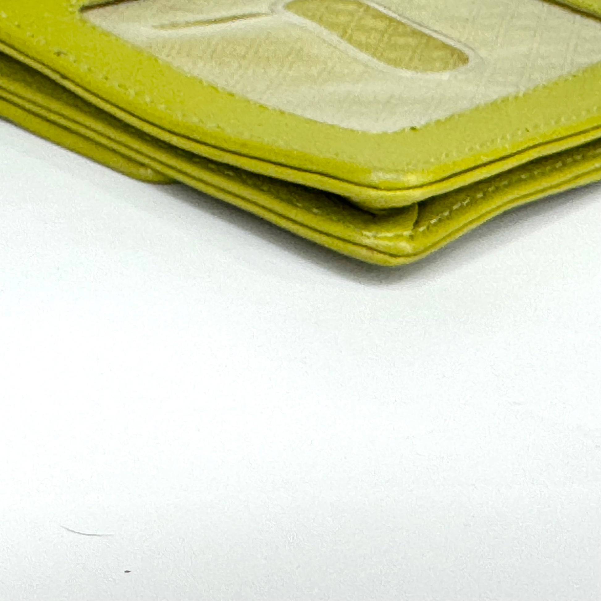 Chartreuse leather lanyard wallet corner and edge condition